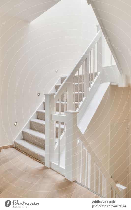 White stairway in modern house interior home staircase white design minimal railing style residential light lamp illuminate apartment dwell simple loft building