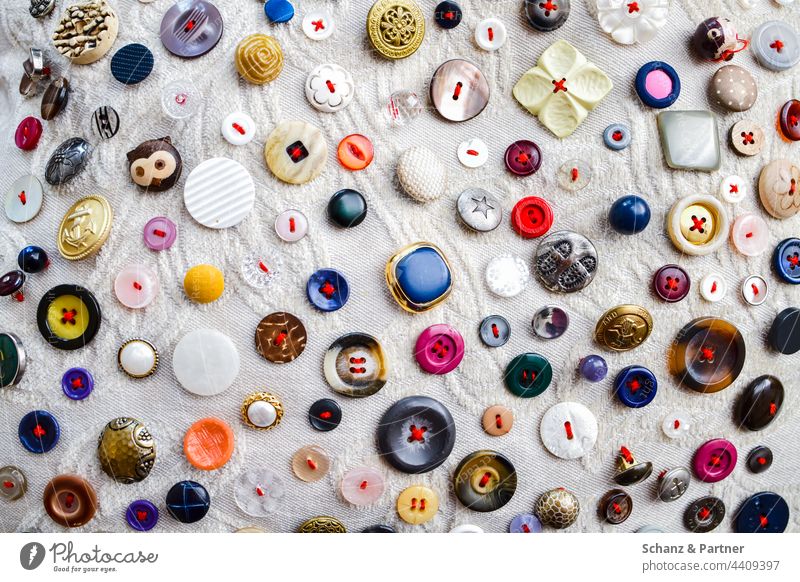 many different buttons Buttons knob diversity variety Sewing stitched Cloth Clothing Fashion Tailor Craft (trade) textile Handcrafts variegated