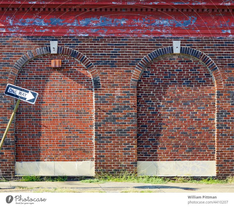 One way one way Wall (building) Road sign One-way street Wall (barrier) Exterior shot Deserted Facade Colour photo