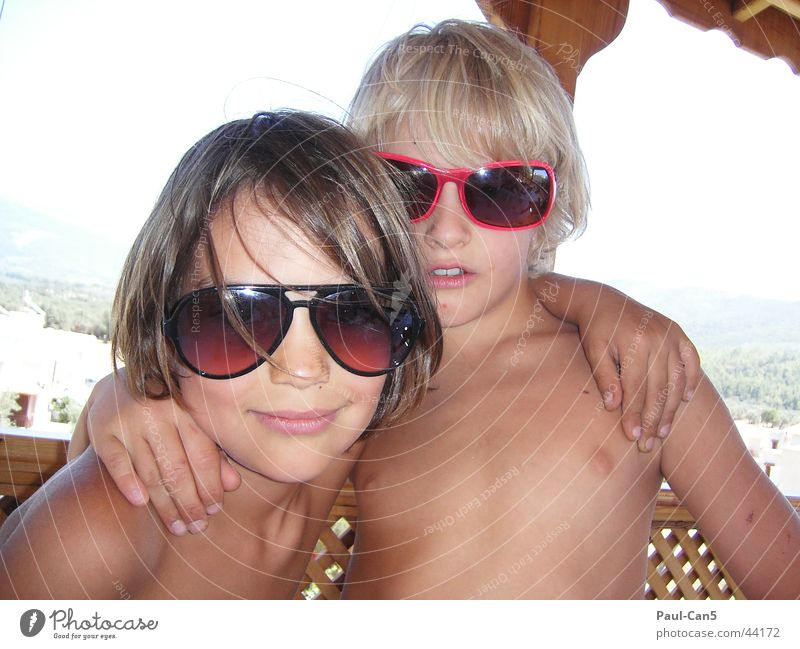 https://www.photocase.com/photos/44172-cool-guys-sunglasses-summer-child-dark-man-photocase-stock-photo-large.jpeg