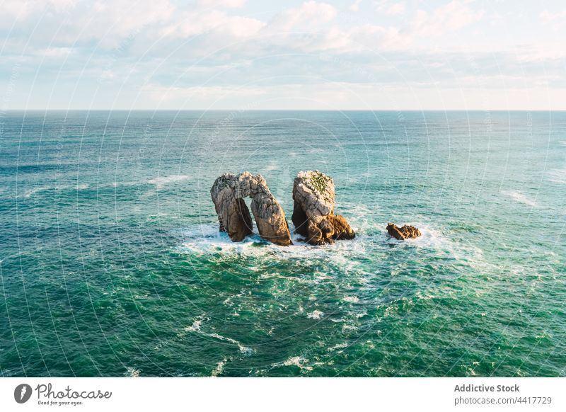 Rocky formations in rippling sea rock ocean seascape nature cliff turquoise stone ripple water spain liencres cantabria rocky picturesque scenic scenery wave