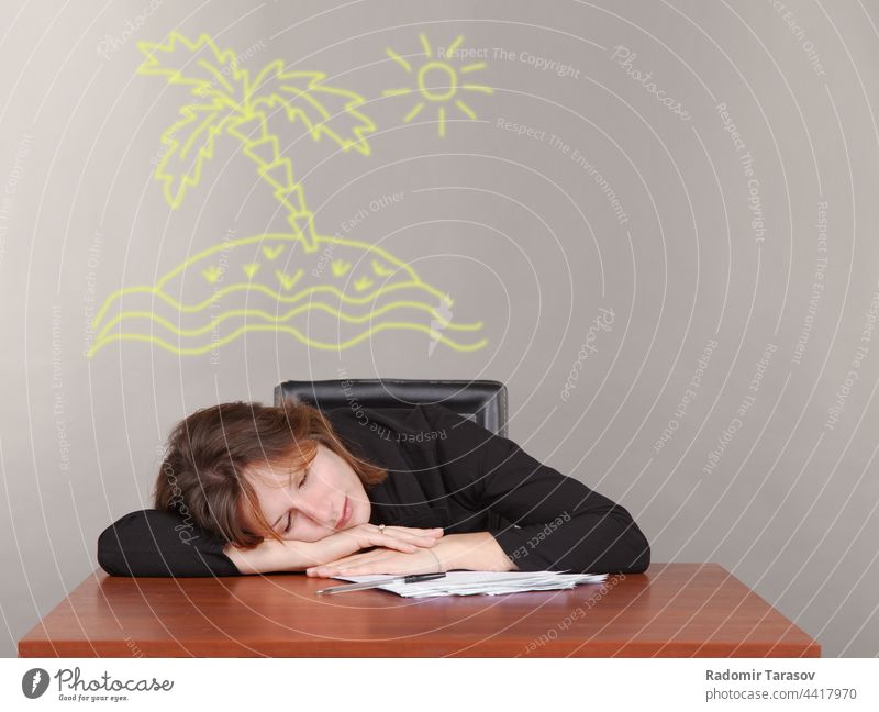business woman sleeping at a desk businesswoman office female table tired work job people young professional adult workplace beautiful overworked girl lady