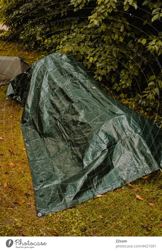 Tent over tent in heavy rain Camping voyage camping Tarpaulin tarpaulin Rain Camping site cover Green Meadow Wet Bushes leaves Summer one-man tent Bivouac