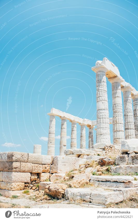 The Temple of Poseidon against a blue sky in Greece temple of poseidon greece Archeology historical Ancient cape sounion Greek
