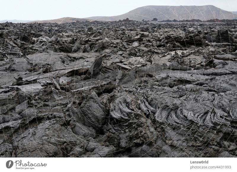Lava field of Iceland's newest volcano, Geldingadalir black geldingadalir hot iceland icelandic landscape lava magma rock scenery smoke stone tectonic volcanic