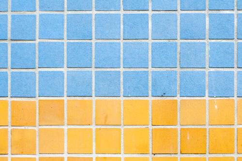 tile design House (Residential Structure) Building Prefab construction Wall (barrier) Wall (building) Facade Sharp-edged Hideous Town Blue Yellow Tile Square
