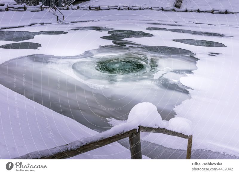 Fish pond with melting ice on water surface melted ice background beautiful few group white outdoors aeration aerating aerated pond aerated water fresh water