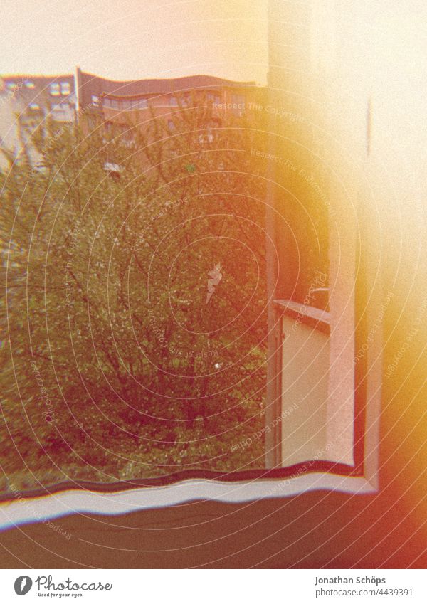 View window 90s style Light leak Yellow Orange at home hobby vintage Retro Leisure and hobbies Colour photo Balcony outlook Backyard Vantage point