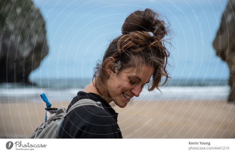 a smiling girl on the beach Girl Smiling Beach Ocean Colour photo Horizontal Happy Public Holiday