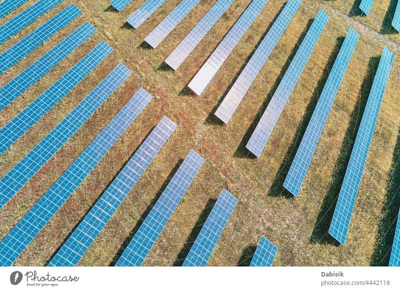 Solar panels farm in the field solar battery energy power sun alternative sustainable renewable plant photovoltaic ecosystem environmental green industry aerial