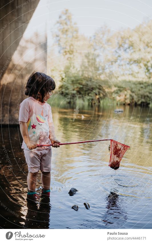 Cute girl playing in the river Child Girl 1 - 3 years Caucasian Playing River River bank Summer Joy Human being Infancy Day Nature Exterior shot Colour photo