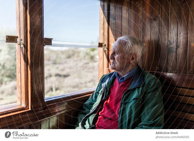 Journey to the memory of an old man in the train of his youth transport sadness railroads relax lonely travel vacant human navigation outdoor freedom waiting