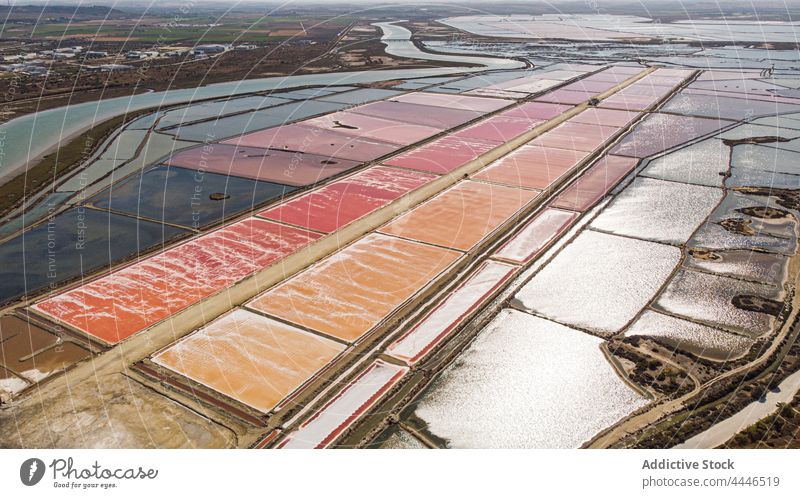 Aerial drone view of some brine salt flats in Andalucia, Spain mineral pond landmark landscape nature salinas water farm salines beautiful spain salt water red