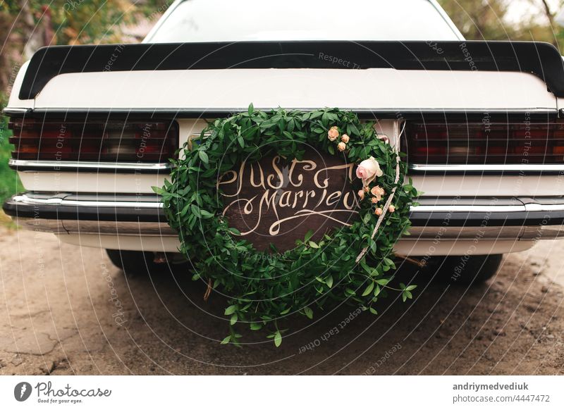 just married car. Beautiful wedding car with plate JUST MARRIED beautiful decorations design bride happy background white fashion celebration love romantic