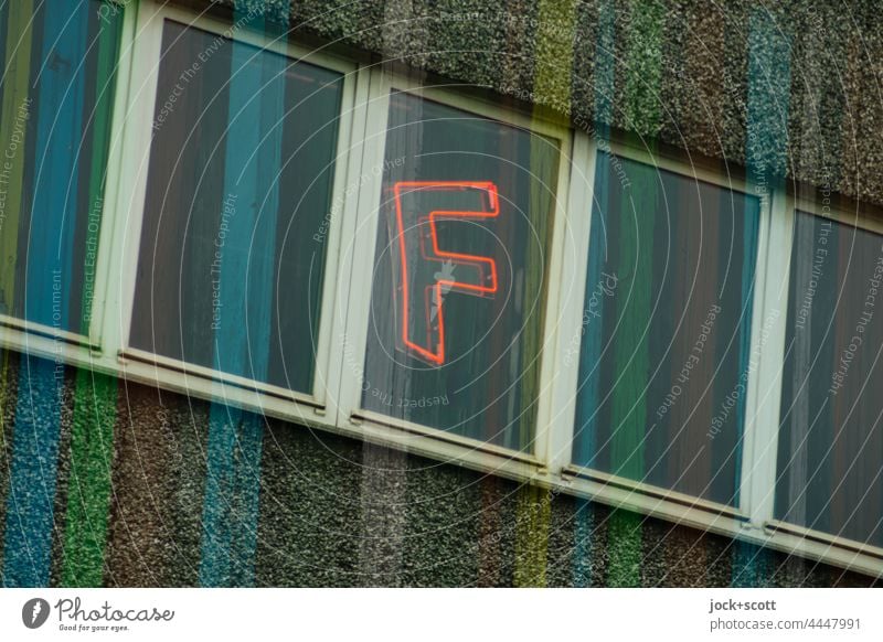 F on the window with colorful stripes Capital letter Facade Typography Signs and labeling Double exposure Window Stripe slanting Kreuzberg Berlin Street art
