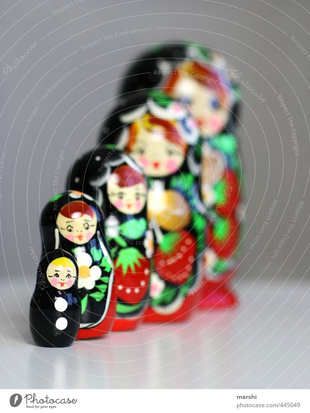 When I grow up, I'll be a matrioshka. Leisure and hobbies Playing Wood Red Black Matryoshka Doll Russia Shallow depth of field Small Decoration Row Colour photo