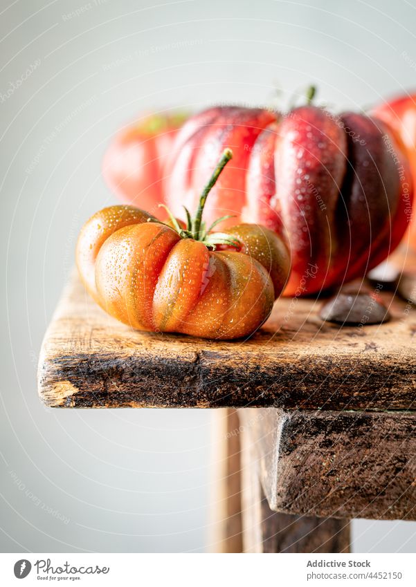 Closeup of several red tomatoes raw fresh vegetable ripe background food closeup vegetarian ingredient organic healthy group natural nature diet color