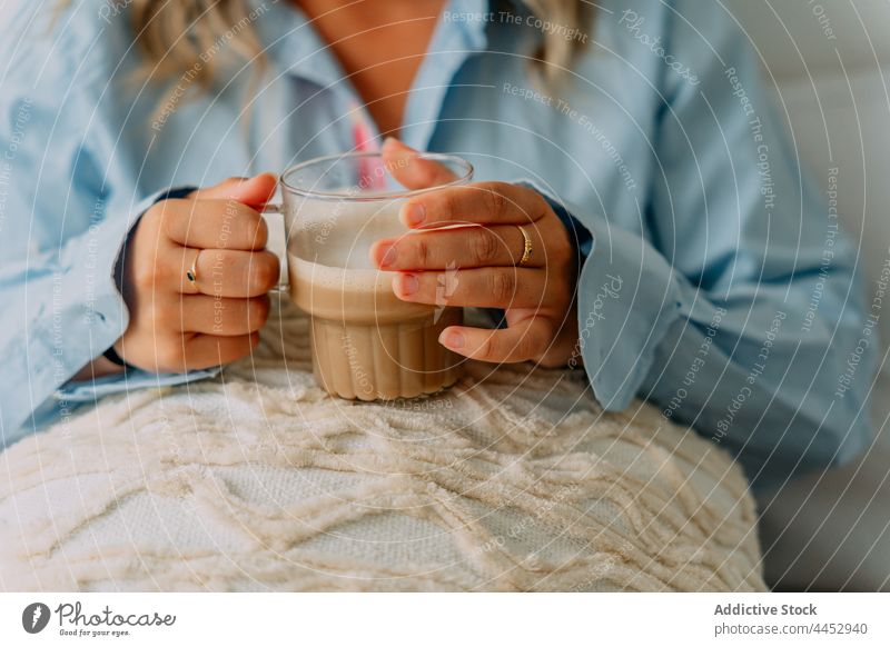 Dreamy woman enjoying delicious latte at home drink coffee hot drink beverage natural aroma foam aromatic cup scent dairy froth milk transparent dreamy