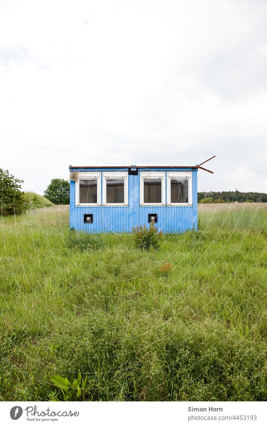 Container house Meadow Accommodation Stranded Deserted House (Residential Structure) Mobile home Window makeshift Escape Hiding place Grass Blue Wall (barrier)