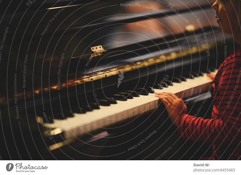 Child at the piano - the joy of music Piano Music Musical instrument Joy fun fumble Fingers Make music Playing Musician Culture Practice