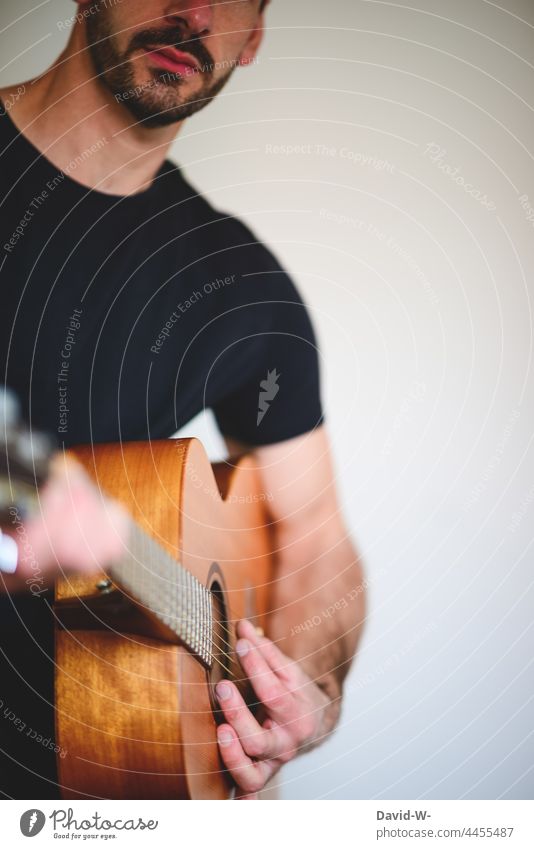 Man playing guitar Guitar Playing Musician Guitarist Make music Musical instrument Copy Space Anonymous