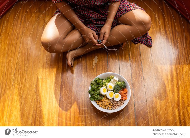 Anonymous woman eating healthy lunch in bowl super food healthy food homemade nutrition diet salad female delicious chickpea fork lifestyle appetizing