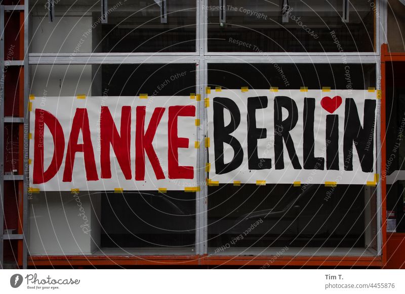 a banner in the window of a shop with the inscription "Thank you Berlin". Schönhauser Allee Colour Thank you. I'll take care of it. Prenzlauer Berg Downtown