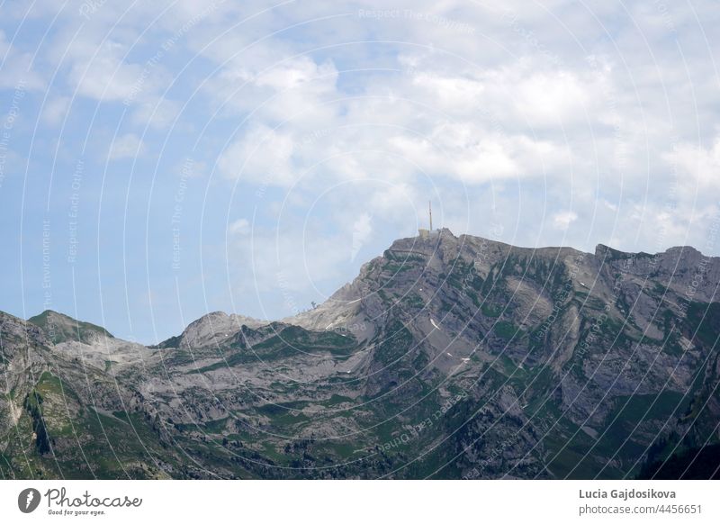 Panoramic view of Saentis mountain in Switzerland in summer time. It is an important landmark of the region and one of the highest mountains in Alps in general. Copy space available.