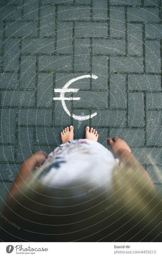 Child and Euro Sign - Childhood Future and Money - Child Benefit insecurity Ambiguous Fear of the future finance annuity young generation child benefit Save
