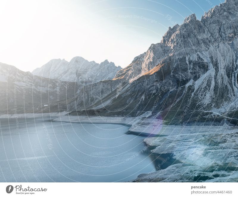 race against time Alps mountain Lake Lünersee Climate change aridity Global warming Switzerland Austria Germany Europe triangle Sunrise Hiking Landscape Rock