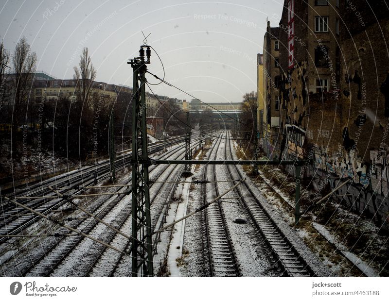 a winter day over the Ringbahn Bad weather Prenzlauer Berg Berlin hazy Railroad system Winter Snow ring track Snowfall Traffic infrastructure Means of transport