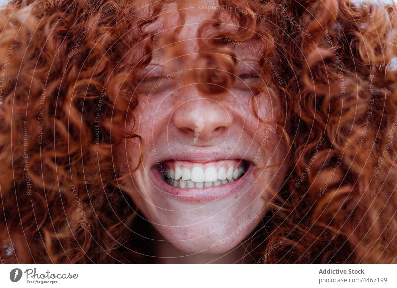 Cheerful ginger woman with eyes closed laugh fun human face joy happy redhead female optimist curly hair portrait expressive having fun red hair ginger hair