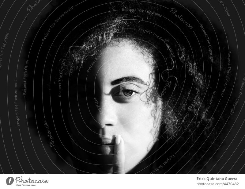 Portrait of a woman sensually touching her lips with a finger portrait Portrait of a young girl bnw Black & white photo Afro Afro Hair Afro Woman Afro Girls