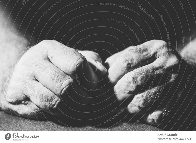 black and white photograph two relaxed hands adult bright bw closeup contrast dark expression finger fist gesture human lying macro male monochrome people