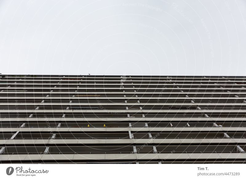 View up at a slab building facade in Berlin Downtown Berlin Capital city Architecture Town Middle Exterior shot Germany Deserted City Manmade structures Sky