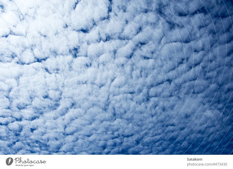 White fluffy clouds in the bright blue sky with light from the Sun sun white background day glare flash nature outdoor space sunlight vibrant weather air travel