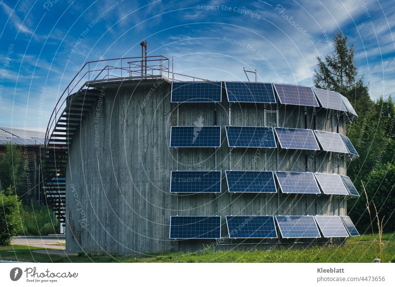 Photovoltaic system on a round concrete building - Renewable Energies Concrete building renewable energies Energy industry Technology Sky Blue sky