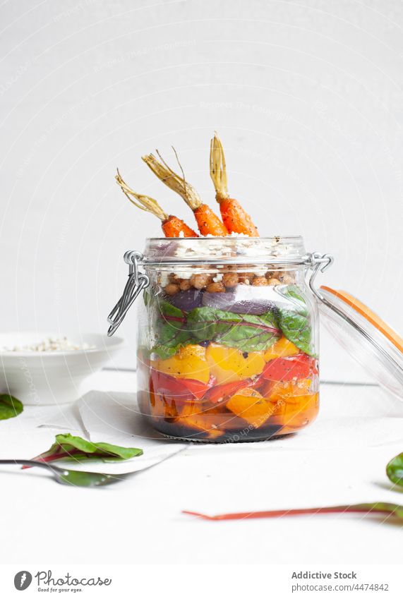 Glass jar with tasty salad vegetable bulgur bell pepper carrot serve meal food culinary cereal delicious raw fresh nutrition healthy organic colorful ripe