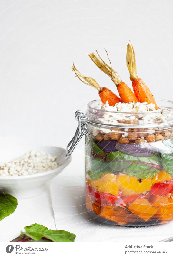 Glass jar with tasty salad vegetable bulgur bell pepper carrot serve meal food culinary cereal delicious raw fresh nutrition healthy organic colorful ripe
