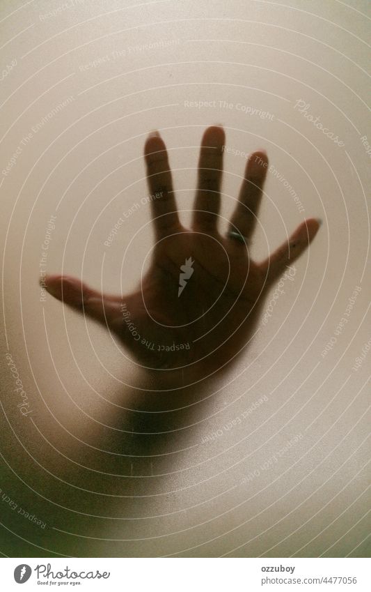 Close up of woman show stop gesture sign by hand saying no to domestic violence or abuse person palm female symbol human serious background showing warning