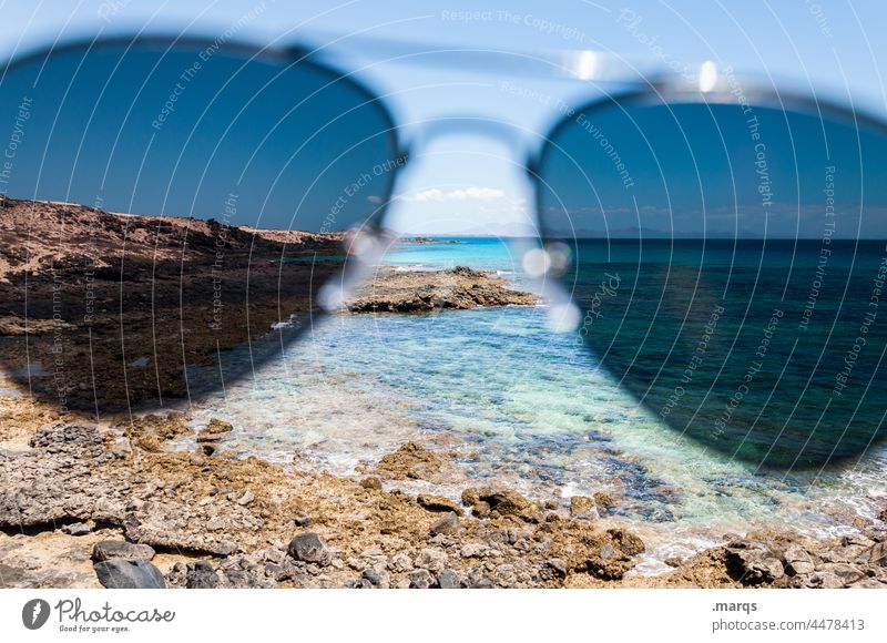 Perspective on vacation Ocean Rock coast Horizon Beautiful weather Sunglasses Vista Tourism Experimental Summer Vacation & Travel Eyeglasses Water tinted