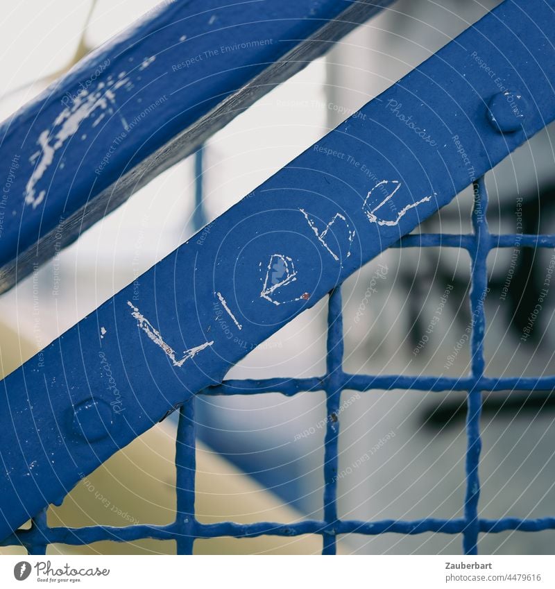 Love lettering carved on a blue steel railing writing Steel Blue Grating Characters Letters (alphabet) Sign obliquely Square romantic Eternalized Memory Couple