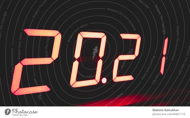 Digital clock with red led light illumination numbers 2021 in the dark time electronic section digital watch alarm symbol countdown dial gadget illuminated