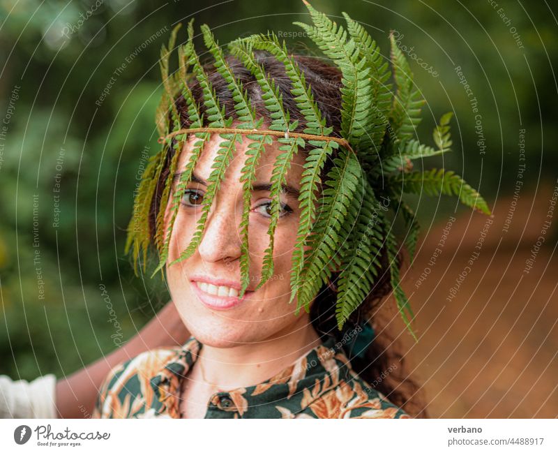 ypung caucasian woman with a fern as a natural organic crown as queen of the fall love happy relationship together people young lifestyle romance girlfriend