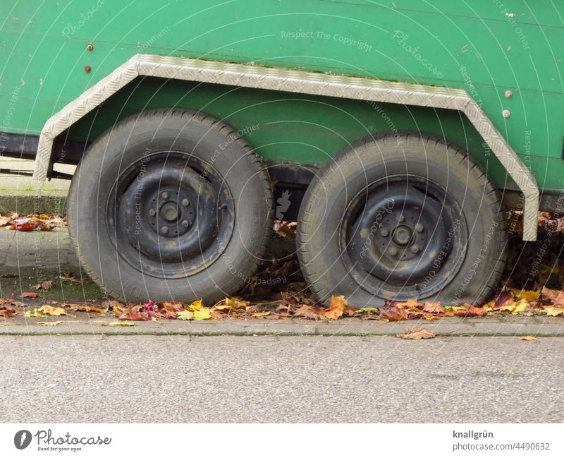 flat foot Flat tire Motoring Trailer Road traffic Exterior shot Means of transport Colour photo Utility vehicle broken Broken slabs Air out Old Autumn leaves