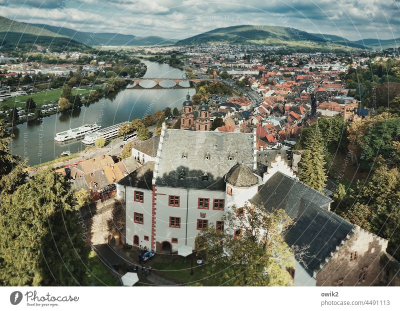 Miltenberg Lower Franconia Small Town County seat famous Tourist Attraction mainfranken Main River Bridge pleasure boat mountains forests houses roofs castle