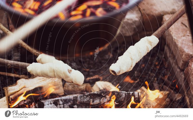 Bread on a stick at the campfire stumblebum Fire Fireplace Wood Flame Nature Burn Warmth Exterior shot Colour photo