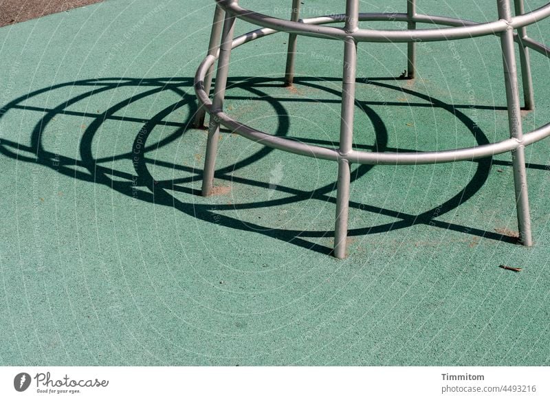 Lines - climbing device on playground climbing equipment Playground Climbing Playing Metal lines Shadow Floor covering Silver Green Black Exterior shot Deserted