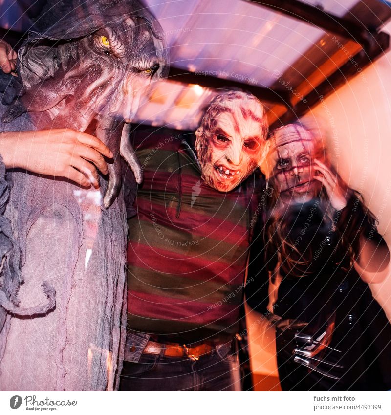 Halloween masks, horror party, Cthulhu, Freddy Kruger Creepy Hallowe'en Freddy Krüger horrendous Colour photo portrait Mysterious Fear Dreadful shiver ghostly