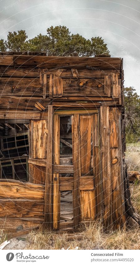 Old Abandoned wooden house in the mountains Forest Mountains Adventure Travel Wooden home Wooden house Abandoned home Abandoned house ghost town Woods door